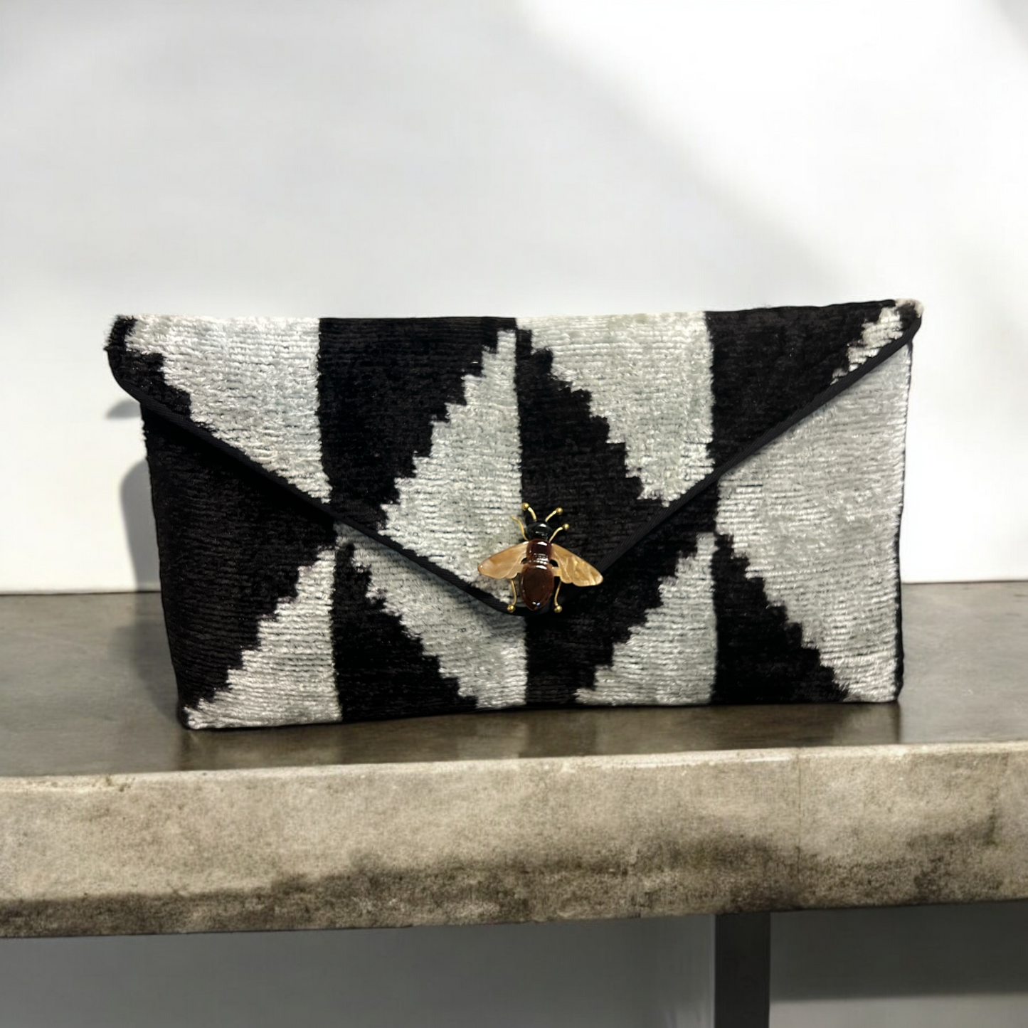 Clutchbag in velluto di seta ikat