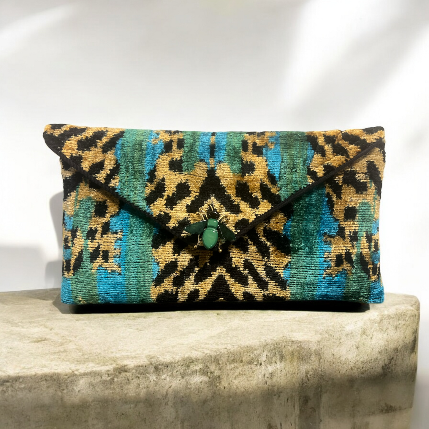 Clutchbag in velluto di seta ikat